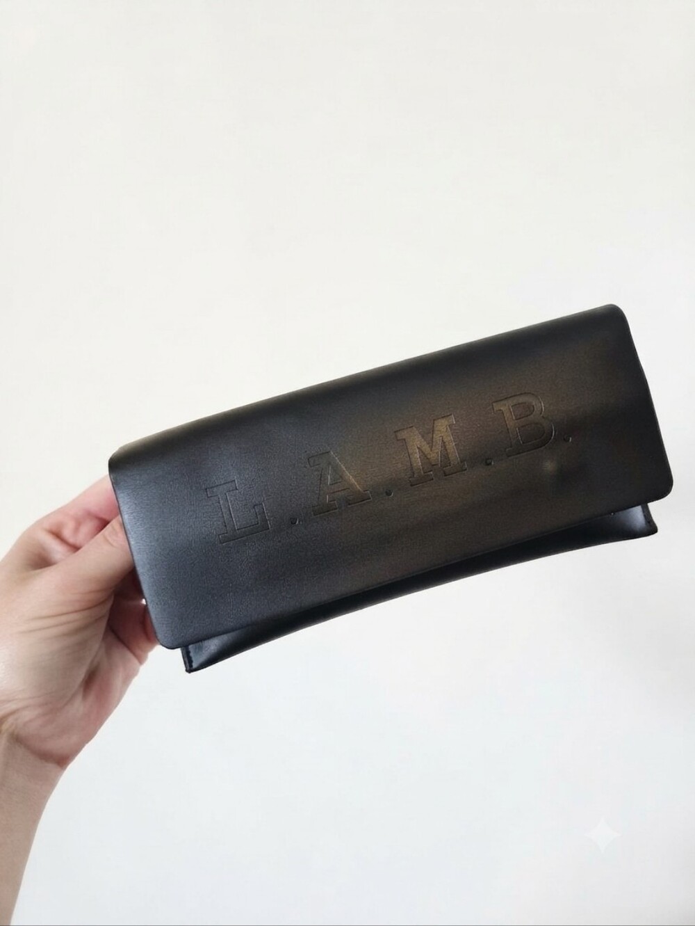 L.A.M.B. by Gwen Stefani Black Eyeglass Case | Embossed Logo Magnetic